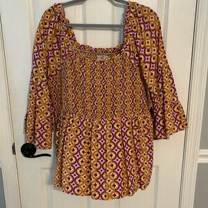 Beautiful flowy summer blouse.